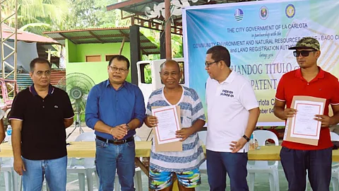 Distribution of Land Titles under DENR’s Handog Titulo Program