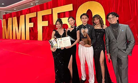 'DIVING' AT THE MMFF. The production team of Salom Productions of the University of the Philippines Mindanao (UPMin) attended the 2024 Metro Manila Film Festival (MMFF) Gabi ng Parangal on Friday, December 27, 2024 at the Solaire Grand Ballroom in Parañaque City. (From left:) Rachelle Baldonasa, Production Head; Hanzen Jornales, Director of Photography; Ryan Paolo Resuena, Director and Writer; Lara Felescoso, Assistant Production Head; and Dan Oledan, Lead Actor. Salom's entry, "PNB 12-50" clinched third place in the Best Student Short Film Competition at the 2024 MMFF.