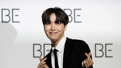 SOUTH KOREA. J-Hope, a member of South Korean K-pop band BTS, poses for photographers during a press conference to introduce their new album "BE" in Seoul, South Korea, November 20, 2020.