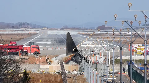 The wreckage of a Boeing 737-800 plane operated by South Korean budget airline Jeju Air lies at Muan International Airport in Muan, South Korea, on December 31, 2024. (AP)