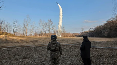 In this photo provided by the North Korean government, its leader Kim Jong Un, right, inspects testing of sea-to-surface strategic cruise-guided weapons at an undisclosed location in North Korea, Saturday, Jan. 25, 2025. Independent journalists were not given access to cover the event depicted in this image distributed by the North Korean government. The content of this image is as provided and cannot be independently verified. Korean language watermark on image as provided by source reads: "KCNA" which is the abbreviation for Korean Central News Agency. (Korean Central News Agency/Korea News Service via AP)