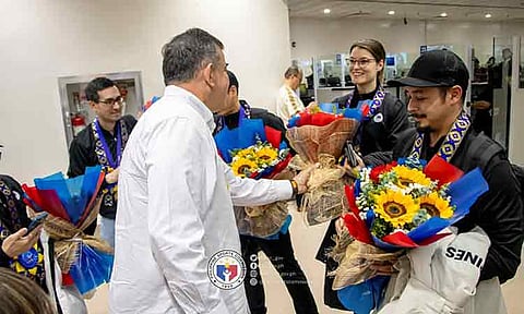 HERO’S WELCOME. Philippine Sports Commission (PSC) chairman Richard Bachmann leads the welcome of the men’s curling team that won the country’s first-ever gold medal at the 9th Asian Winter Games in Harbin, China.
