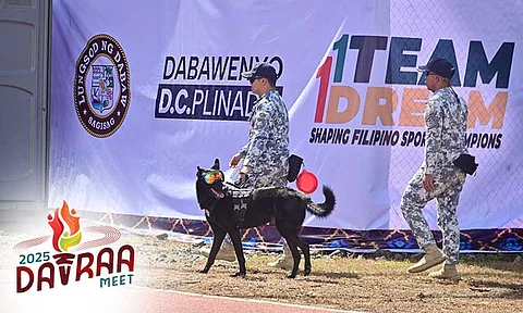 Security personnel with a K9 patrol Davao City-University of the Philippines (DC-UP) Sports Complex during the opening ceremony of the 2024 Davao Region Athletic Association (Davraa) Meet. For the 2025 edition, at least 345 police personnel will be deployed to ensure safety from March 9 to 15 in Davao del Norte.