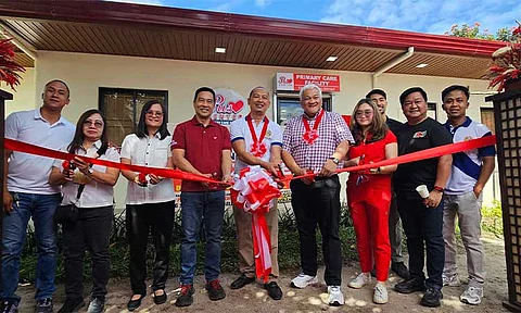 PRIMARY CARE FACILITY. Angeles City Mayor Carmelo ' Pogi' Lazatin. Jr. and First District Congressman Carmelo ' Jon' Lazatin II led the opening of primary health care facilities in Barangay Pulung Maragul and Barangay Malabanias. (Photo by Chris Navarro)