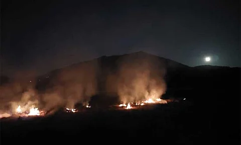 GRASS FIRE
More than 13 hectares of properties, with trees and grass, were affected by a bushfire in Barangay Gatiawin, situated in Mount Arayat on Sunday night. --Photo by Kenneth Madlangbayan