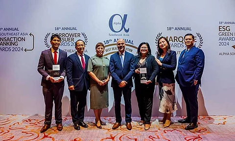 Photo shows DBP Senior Vice President Mario Rey T. Morales (second from left), DBP Senior Vice President Ana Marie E. Veloso (third from left), DBP Vice President Raquel C. Atienza (third from right), and DBP Senior Assistant Vice President Maria Eliza C. Galvan (second from right) receiving the Best Syndicated Loan Deal of the Year 2024 award on behalf of DBP. Also in photo are San Miguel Holdings Corporation Head of Treasury William Henry S. Timoteo (leftmost), Alpha Southeast Asia Chief Executive Officer and Publisher Siddiq Bazarwala (center), and Assistant Vice President for Special Projects John Patrick De Las Penas (rightmost).