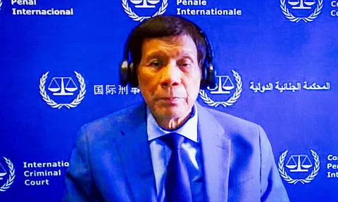 Former Philippine President Rodrigo Duterte is seen on a screen in the courtroom of the International Criminal Court (ICC) in The Hague, Netherlands, Friday, March 14, 2025.