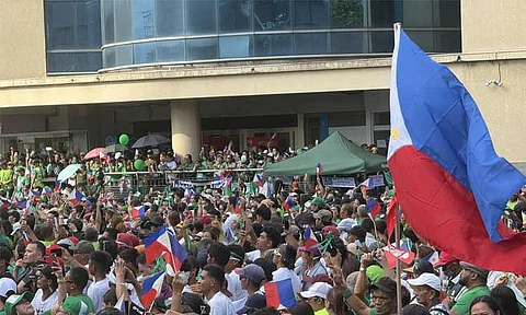 Thousands in green-filled Roxas Freedom Park, waving Philippine flags as they marked former President Rodrigo Duterte’s 80th birthday, highlighting his enduring influence in Davao City.