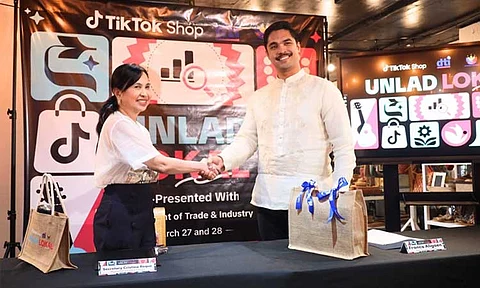 From left: DTI Secretary Cristina A. Roque and TikTok Shop Marketing Lead Franco Aligaen.