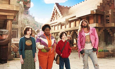 (From left) Emma Myers as Natalie, Danielle Brooks as Dawn, Sebastian Eugene Hansen as Henry, and Jason Momoa as Garrett, in #MinecraftMovie, now showing in cinemas.