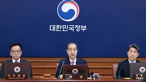 South Korean acting President Han Duck-soo, center, speaks during a Cabinet meeting at the government complex in Seoul, South Korea, Tuesday, April 8, 2025. (AP)