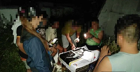 ILOILO. Estancia Municipal Police Station personnel conduct documentation of seized suspected shabu worth P673,200 and present arrested suspects alias Jun Jun and alias Siping following a successful buy-bust operation in Barangay Tacbuyan, Estancia, Iloilo, on April 10, 2025.