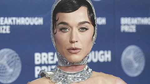 Ahead of spaceflight, Katy Perry reads Sagan, channels ‘feminine divine’