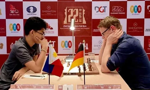 STUNNING UPSET. Panabo City’s Fide Master Christian Gian Karlo Arca, left, shocks top seed Super Grandmaster Jan Gustafsson of Germany in the third round of the ongoing 22nd Bangkok Chess Club Open on Tuesday, April 15, 2025, held at the Royal Orchid Sheraton Riverside Hotel in Bangkok, Thailand.