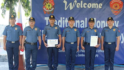 ZAMBOANGA. Police Colonel Barnard Danie Dasugo, Zamboanga Sibugay police director (3rd from right), on Monday, April 21, 2025, awards Letter of Commendation to Police Captain Arnold Tolentino, Siay Municipal police chief (3rd from left) and Police Lieutenant Alan Zamora, officer-in-charge of the 2nd Provincial Mobile Forces Company (2nd from right) for their respective accomplishments in law enforcement operations. (SunStar Zamboanga)