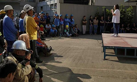 Trabaho Partylist nominee Atty. Johanne Bautista reminding skilled workers to prioritize their safety during a workplace visit.