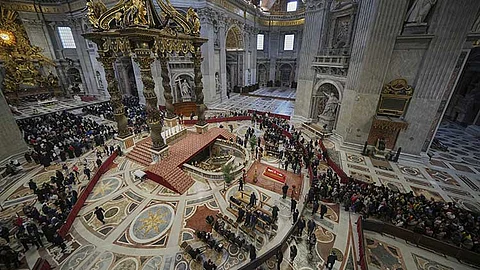 Tens of thousands file into St. Peter's Basilica to pay final respects to Pope Francis