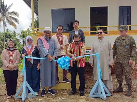 ZAMBOANGA. The Ministry of the Interior and Local Government-Bangsamoro Autonomous Region in Muslim Mindanao awards single-detached housing units to 38 former Abu Sayyaf Group (ASG) members in Tumahubong village, Sumisip, Basilan Wednesday, May 28. The project is under the Project Tulong ng Gobyerno sa Nagmamalasakit (Tugon), a flagship initiative of Barmm.