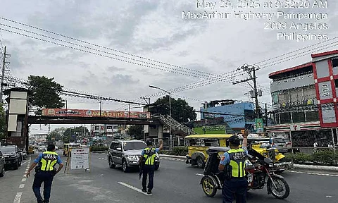 Police officers man a checkpoint in Angeles City, Pampanga in this undated photo. Over 2,000 "night patrollers" have been deployed across Central Luzon beginning Wednesday (May 28, 2025) to strengthen security and deter criminal activity in accordance with President Ferdinand R. Marcos Jr.'s order for increased police visibility. (Photo courtesy of Angeles City Police Office)