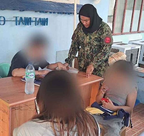 ZAMBOANGA. Lawmen rescue two potential victims of human trafficking, including an eight-year-old boy, on Friday, May 30, at the port of Bongao, the capital town of Tawi-Tawi. The two are residents of Laguna.