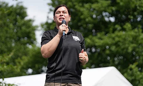 Vice President Sara Duterte speaking in front of her supporters during an event at Laan van Reagan en Gorbatjov Park in The Hague, Netherlands.