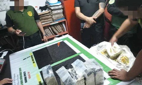 DRUGS FROM THE SEA. Authorities conduct an assessment of the estimated P1.5 billion worth of suspected shabu discovered by 10 Bataan fishermen floating in the waters of the West Bajo de Masinloc on May 29. (Photo courtesy of PDEA)