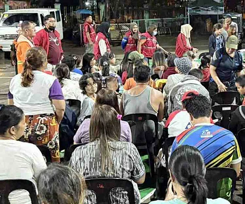 ZAMBOANGA. Personnel of the Department of Social Welfare and Development, in coordination with the City Social Welfare and Development Office, distribute family food packs Saturday, June 7, to families displaced by flood in different areas in Zamboanga City. A total of 1,028 families with 3,513 individuals were evacuated to safer grounds in at least 12 villages due to flashflood spawned by southwest monsoon and low-pressure area.