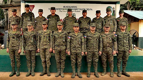 Major General Michael G. Samson, commander of the 3rd Infantry Division, pins the Military Merit Medal on one of the 15 soldiers from the 94th Infantry Battalion recognized for bravery in a June 6 encounter with NPA remnants in Himamaylan City. (Photo courtesy of the 3rd Infantry Division)