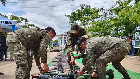 ZAMBOANGA. Troops of the 101st Infantry Brigade arrange the assorted firearms that were destroyed during the official declaration that Basilan as an Abu Sayyaf-Free province on Monday, June 9, 2025. The declaration was made during a multi-sectoral ceremony at the new provincial government center in Sta. Clara village, Lamintan City. (SunStar Zamboanga)