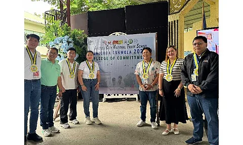 Officials of DepEd Angeles City Division, led by Chief Education Supervisor Amando Concepcion, are joined by City Councilor Edu Pamintuan, and EPMC President Alainne Tan in signing the Pledge of Commitment during the Brigada Eskwela launching at the Angeles City National Trade School on Tuesday, May 10. Princess Clea Arcellaz