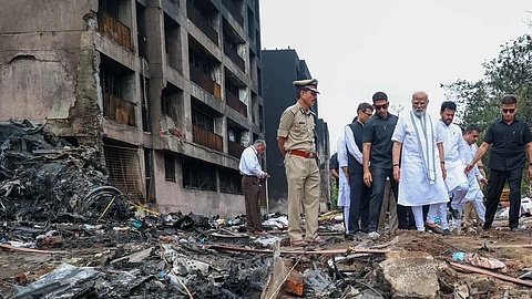 Indian Prime Minister Narendra Modi on Friday, June 13, 2025, visited the crash site of Air India flight AI 171 in the western state of Gujarat and later met with the injured at a civil hospital, officials said. (Xinhua)