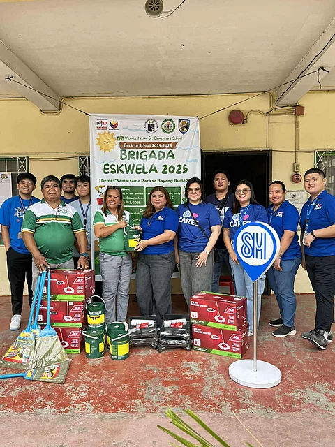 SM Lanang Assistant Mall Manager Apple Legario (6th from right) turned over cleaning supplies and tools to Vicente Hizon, Sr. Elementary School Head Lubel Banaria.