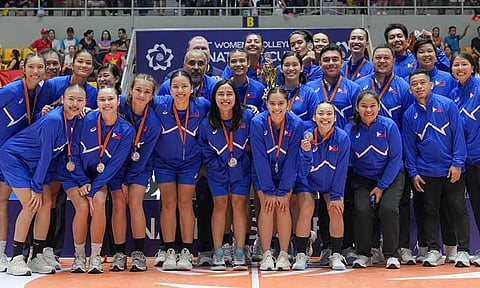 SILVER THAT GLITTERS LIKE GOLD. Members of Team Philippines celebrate the silver medal finish in the Asian Volleyball Confederation (AVC) Women’s Volleyball Nations Cup on Saturday night in Hanoi.