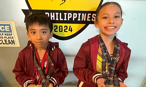 OLYMPIANS IN THE MAKING. Davao City gymnasts Kei Nigel Teves and Chalsea Belle Louise Tuazon proudly display their medals after standout performances at the Ilocos Norte 2025 Palarong Pambansa, marking a milestone debut on the national stage.