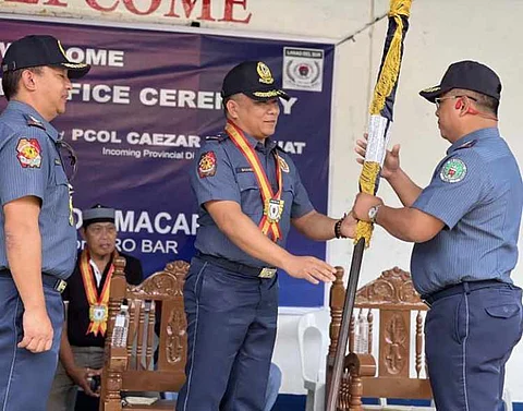 ZAMBOANGA. Police Brigadier General Alan Manibog, PRO-BAR deputy director for administration (center), hands over the command flag of Lanao del Sur Police Provincial Office to Police Colonel Caezar Cabuhat, who succeeded Police Colonel Robert Daculan (left) as the new police director of the province. The Turn-Over of Office Ceremony was held Wednesday, June 18, at Camp Bagong Amai Pakpak, which houses the headquarters of LDSPPO in Marawi City.