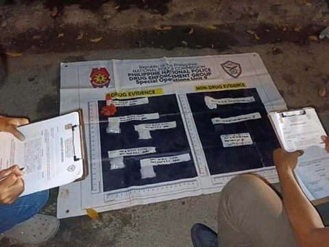 ZAMBOANGA. Lawmen conduct an inventory of evidence seized from a high-value individual during an anti-drug operation on Thursday, June 19, in Zone 4, Zamboanga City. The suspect yielded an estimated P1.3 million worth of suspected shabu.