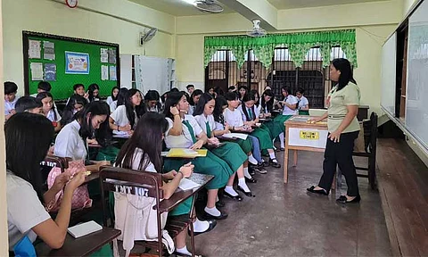BACK TO SCHOOL. A teacher is giving a lecture to her class at the Davao City National High School, as the school year 2025-2026 kicked off on Monday, June 16, 2025. Nearly 1.4 million Davao learners returned to school on June 16, diving straight into lessons, according to the Department of Education.