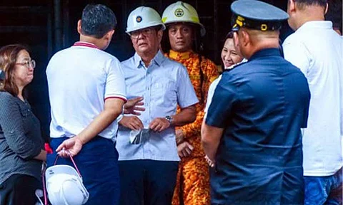 PEOPLE FIRST. President Ferdinand R. Marcos Jr. (3rd from left) visits the fire-damaged building of the San Francisco High School in Quezon City on June 18, directing the Department of Public Works and Highways to lead the construction of a new four-story replacement. Marcos said on Saturday (June 21, 2025) that he is focused on attending to the needs of the country and the Filipino people and has no intention to intervene in how Congress handles the impeachment complaint against Vice President Sara Duterte. (PNA photo by Robert Oswald P. Alfiler)