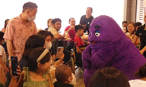 A mascot entertains children with cancer and their families at a gathering organized by Cancer Warriors Foundation (CWF) founder James Auste in Davao City over the weekend.