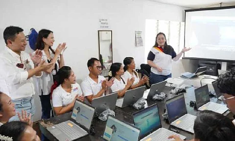LAPTOPS FOR TEACHERS. Education Secretary Sonny Angara (left) leads the distribution of laptops to teachers in Pag-asa island in Kalayaan, West Philippine Sea on Oct. 20, 2024. The Department of Education on Friday (June 27, 2025) reported the accelerated delivery of laptops to teachers and non-teaching staff with the help of the Early Procurement Activity. (Photo courtesy of DepEd)