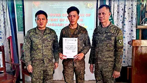 ILOILO. Private Rey Justin Dagsan of the 61st Infantry (Hunter) Battalion receives a Letter of Commendation at Tacas Patrol Base in Valderrama, Antique, on July 2, 2025, for saving a young boy from electrocution in Barangay Lublub.