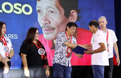 NEGROS. Agrarian Reform Secretary Conrado Estrella III leads the distribution of certificates of condonation with release of Mortgage (COCROM), Certificates of Land Ownership Award (Cloas) and support services to Agrarian Reform Beneficiaries (ARBs) in Bago City, Negros Occidental on Thursday, July 3.
