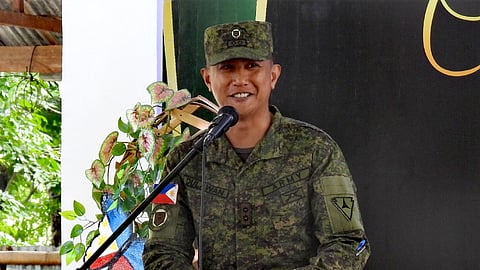 ILOILO. Lieutenant Colonel Jekyll Julian D. Dulawan receives the command symbol from Lieutenant Colonel Arturo S. Balgos Jr. during the Change of Command Ceremony of the 61st Infantry Battalion at Camp Monteclaro, Miagao, Iloilo on July 22, 2025. The turnover was presided over by Major General Michael G. Samson and attended by military officers, local leaders, and peace partners.