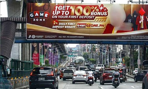 EASY MONEY. An online gambling advertisement is displayed along EDSA in Quezon City on July 8, 2025. Malacañang on Friday (Aug. 1, 2025) said President Ferdinand R. Marcos Jr. will not act in haste on the growing calls to impose a total ban on online gambling, as he sees the need for a thorough study on the potential impact of the proposal on the country. (PNA photo by Joan Bondoc)