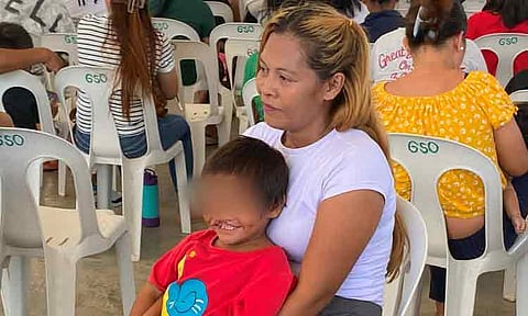 Single mother Jellia Fernandez of Sta. Cruz, Davao del Sur, and her son Joshua, who was born with cleft palate. They are both beneficiaries of DSWD’s Project Cherish.