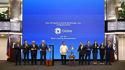 Globe Chairman Jaime Augusto Zobel de Ayala, President and CEO Carl Raymond R. Cruz, SEC Chairman Francis Edralin Lim and officials from Globe, the PSE, and the SEC at the ceremonial bell ringing to mark Globe’s 50th year as a publicly listed company and its leadership in advancing the nation’s digital transformation.