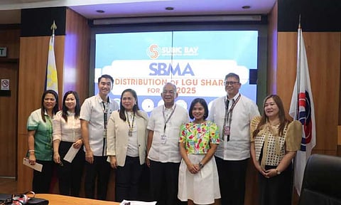 REVENUE SHARES. Subic Bay Metropolitan Authority Chairperson and Administrator Eduardo Jose Aliño joins local officials and representatives from the eight contiguous local government units after the ceremonial distribution of revenue shares for the 1st semester of 2025 held at the SBMA Corporate Boardroom. (Photo courtesy of SBMA)