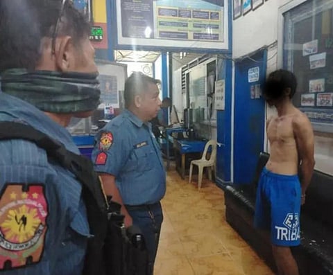 ZAMBOANGA. Lawmen arrest a 32-year-old man (right) and safely rescue his five-year-old child in a hostage-taking incident in Tugbungan village, Zamboanga City, on Thursday, August 14. The incident unfolded around 4:50 a.m. when the suspect suddenly went berserk.