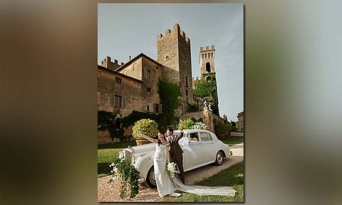 NEWLYWEDS. Mr. and Mrs. Paolo Dino (Janzen Entote) at Castello di Celsa in Tuscany after their wedding at the castle garden.