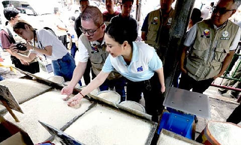 IMPORTED RICE. Agriculture Secretary Francisco Tiu Laurel Jr. says the retail price of 5 percent broken imported rice should not go beyond PHP43 per kilogram amid the impending 60-day rice import ban, in an ambush interview on Friday (Aug. 29, 2025). He advised consumers not to buy or tolerate traders and retailers who will be "taking advantage" of the market. (PNA photo by Ben Briones)
